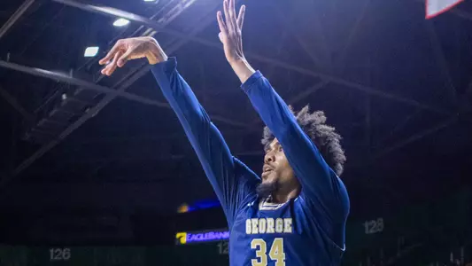 Antoine Smith Jr. shoots a 3-pointer at George Mason