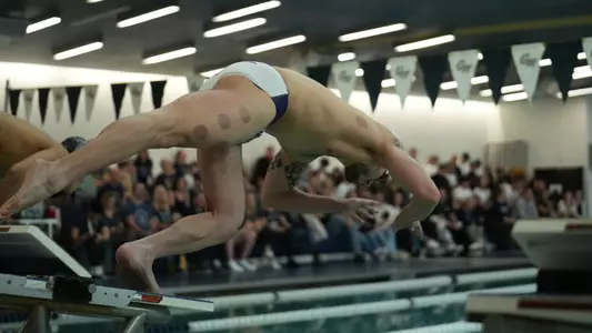 Djurdje Matic diving into Smith Center pool