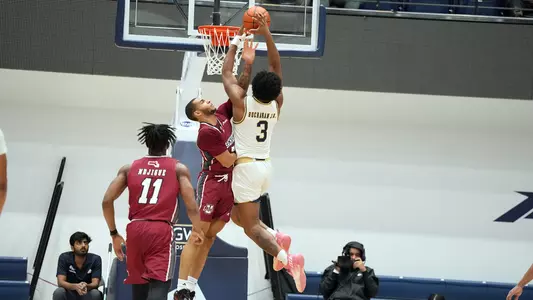 Darren Buchanan Jr. rises to dunk against UMass