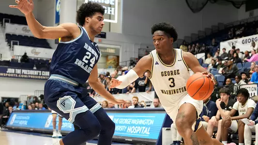 Darren Buchanan Jr. drives against Rhode Island