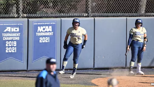 Corpuz and Cano celebrating at the GW Softball Field