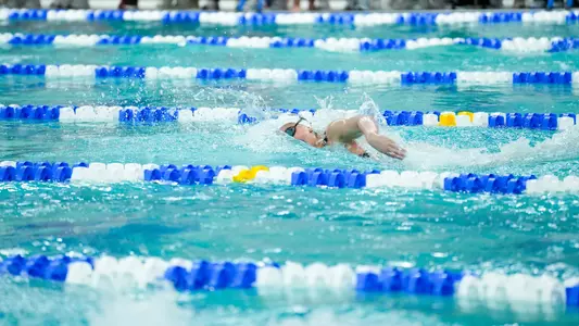 Topolewksi swimming freestyle at the A-10 Championships