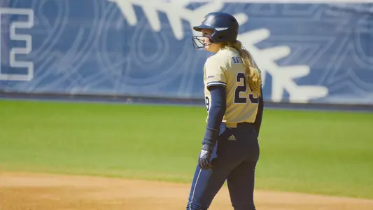 Paige Hayward standing on first base at the GW Softball Field