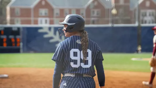 Reese Torres on the base path at the GW Softball Field