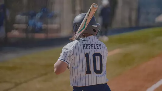 Allison Heffley batting at the GW Softball Field