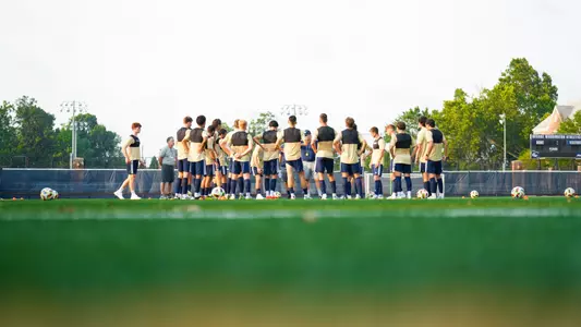 Men's Soccer Team Huddle at First Practice of 2024