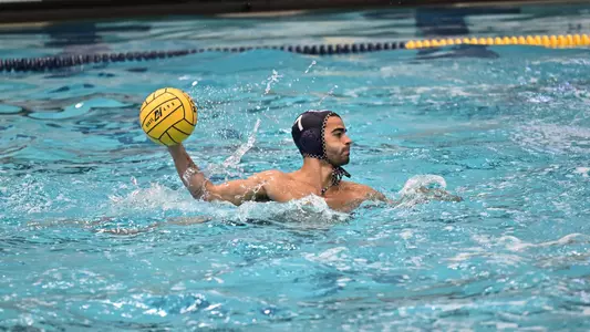 Kai De Orbeta looking for a teammate to pass to at the Navy Invitational