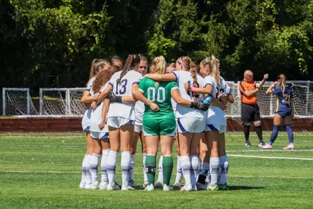 Women's Soccer Team Huddle vs. Drexel