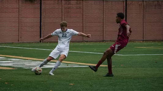 Colin Prendergast hitting a pass past a Rider defender