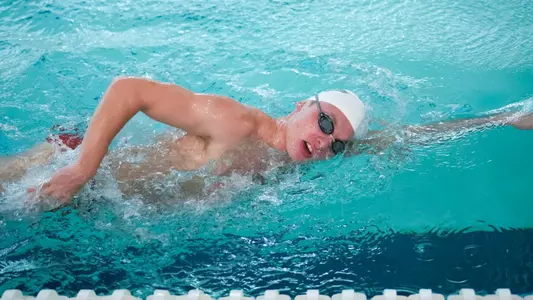 Justin Dostal swimming at the Charles E. Smith Center