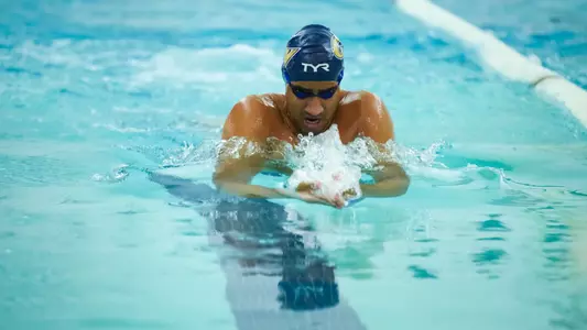 Ganesh Sivaramakrishnan swimming at the Charles E. Smith Center