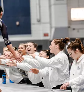 Gymnastics Celebrates the end of the floor rotation