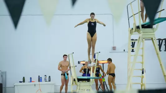 Olivia Paquette diving at a practice at the Smith Center