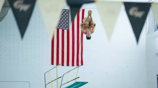 Ben Bradley diving at a practice at the Smith Center
