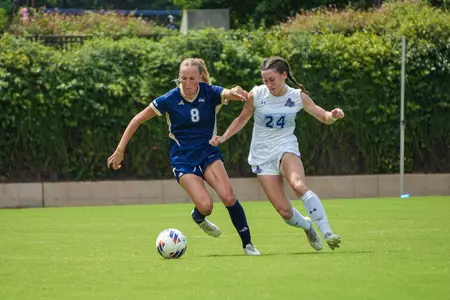 Sophia Broz Fights off a Defender Up the Field