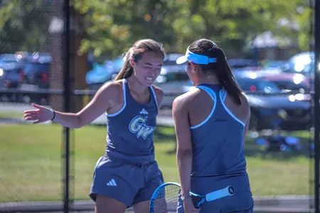 Madison Lee and Victoria Sasinka Celebrate after a Doubles Win