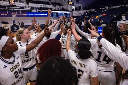 Women's Basketball Team Huddle vs. UDC