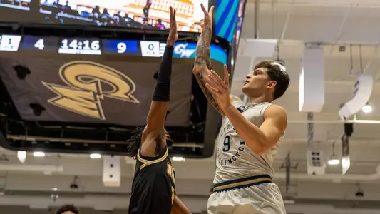 Garrett Johnson shoots a floater against UMBC