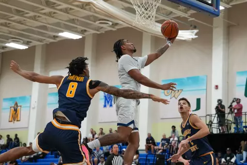 Jean Aranguren executes an acrobatic layup vs. Murray State