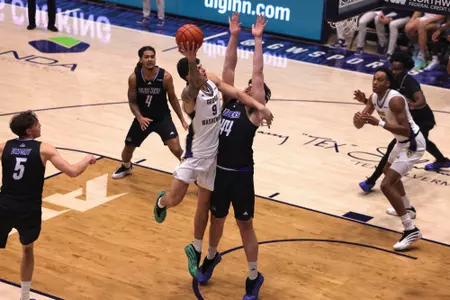 Garrett Johnson attempts a shot against Delaware