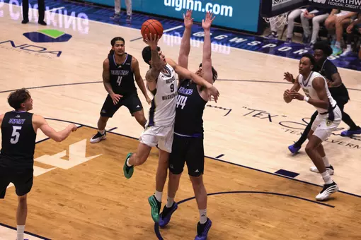 Garrett Johnson attempts a shot against Delaware