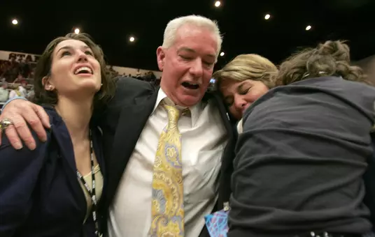 Joe McKeown Celebrates a Win in the NCAA Tournament with GW