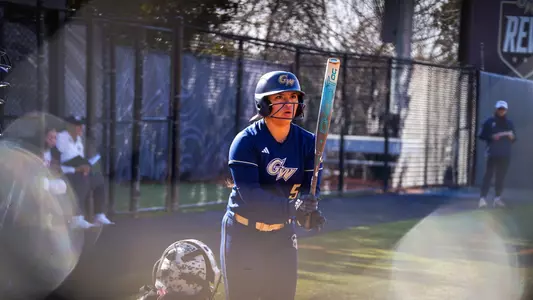 Ashley Corpuz batting vs. Coppin State at the GW Softball Field