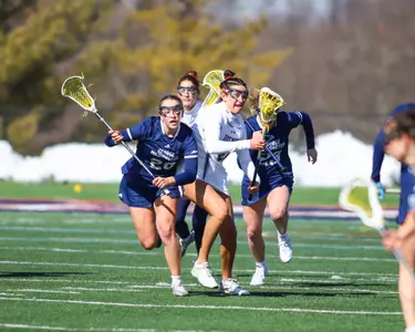 Mckenna Jacobs and Katie Fullowan play defense at Robert Morris