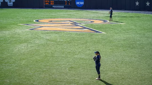 Cadence Gilliland and Paige Hayward covering the outfield at the GW Softball Field