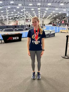 Sarah Mitchell Poses with her silver medal at the A-10 Championships