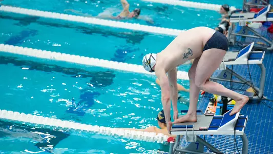 Elliott Irwin swimming at the 2025 A-10 Championships
