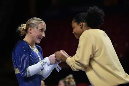 Delaney DeHaan and India Anderson connect as DeHaan prepares for her bar routine