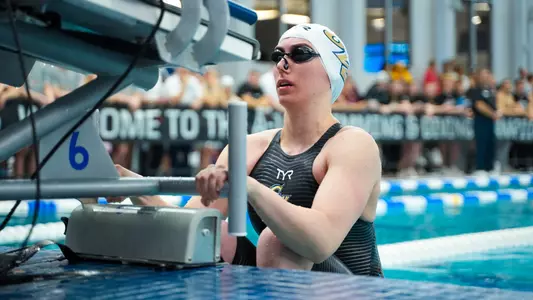 Marlee Rickert on the blocks at the 2025 A-10 Championships