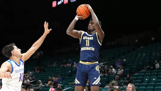 Ty Bevins takes a 3-pointer in the College Basketball Crown