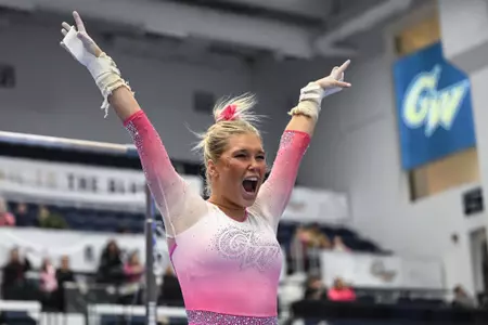 Madi McMullen Celebrates a Stick on Bars