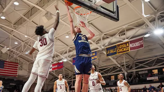 Sean Hansen goes up for a layup at Fordham