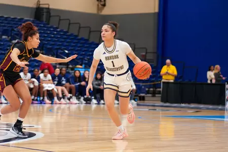 Gabby Reynolds Dribbles up Court vs. Loyola Chicago