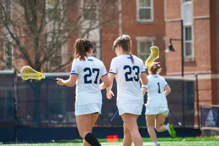 Grace Curry and Katie Fullowan Huddle at the Vern