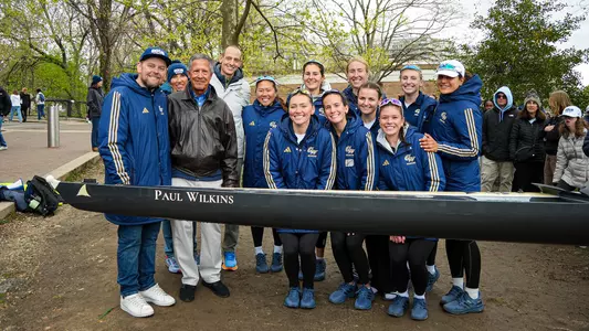 Women's rowing dedicates the Paul Wilkins boat