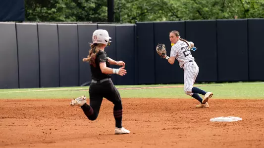 Carolyn Skotz throwing the ball at shortstop