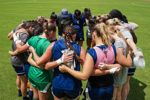 Women's Soccer Team Huddle vs. American