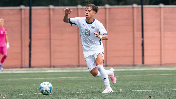 Nico Medina dribbling at the GW Soccer Field