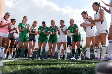 Kate Silverstein Hypes Up the Team Huddle Before Playing VMI