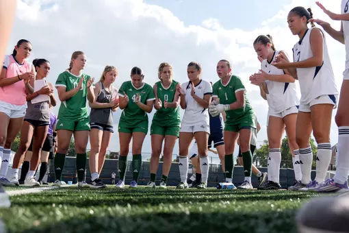 Kate Silverstein Hypes Up the Team Huddle Before Playing VMI