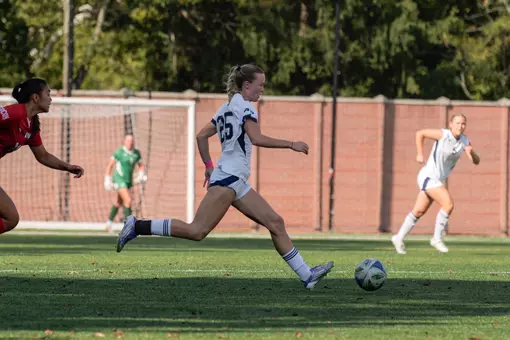 Amelia Booth makes a pass vs.