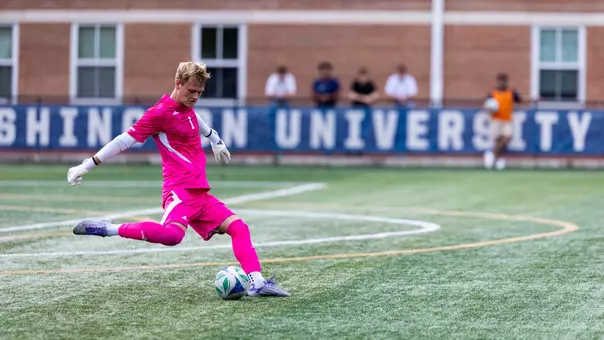 Tom Macauley striking a free kick