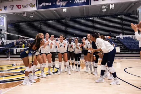 Volleyball sings the fight song after a win