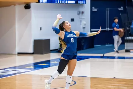 Alexis Rodriguez serves against Morgan State