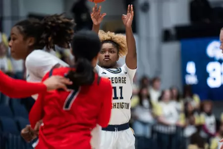 Mia James Shoots Over a Dayton Defender