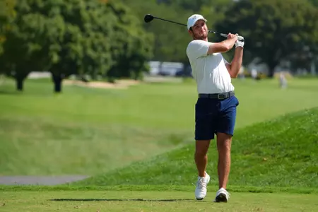 Evan Eichenlaub admires a drive